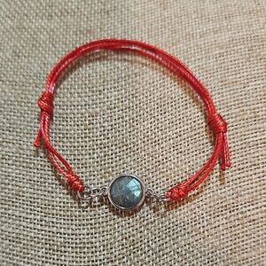Elegant Red Cord Adjustable Bracelet with Labradorite Stone Accents.